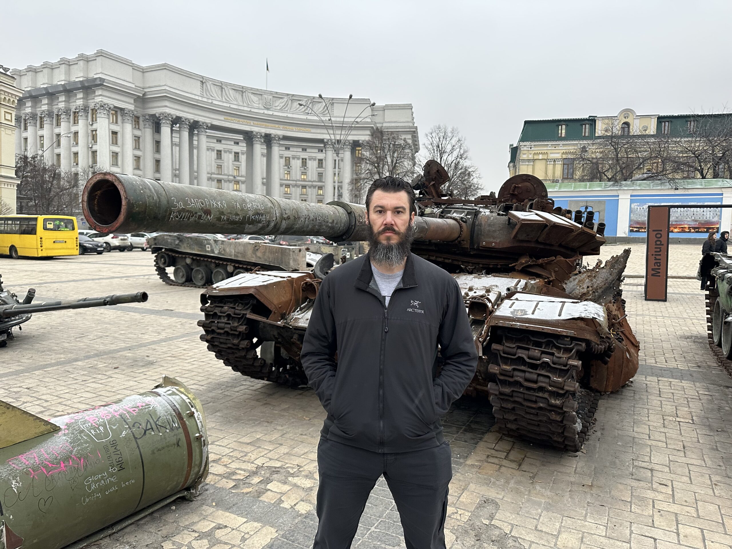 staff sergeant michael bloch marine raider in front of tank