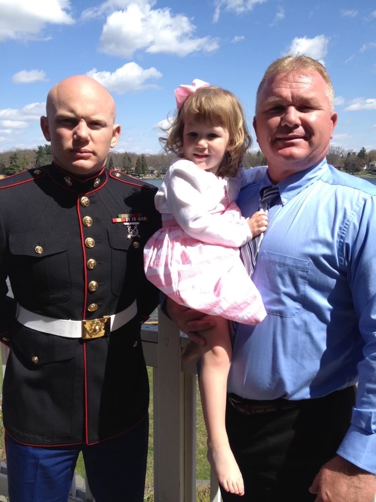 staff sergeant steven smiley with father and daughter